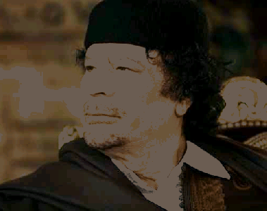 Муамар Каддафи  
